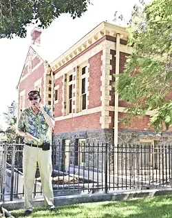 BRICK HOUSE: Joe tells us about the history of the Carnegie Library, which was built in 1905 and now houses the History Center of SLO County. - PHOTO BY JESSICA PENA
