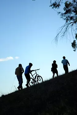 HAPPY TRAILS TO YOU: For more than 20 years, CCCMB has been forging new trails all over the county. Members surveyed recent work at Irish Hills, on the edge of SLO. - PHOTO BY STEVE E. MILLER
