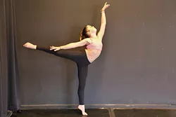 ON POINT : Alexandra Lund, or Sparkles, as she’s known online, works on perfecting her dance technique at her home studio in Arroyo Grande. - PHOTO BY DYLAN HONEA-BAUMANN