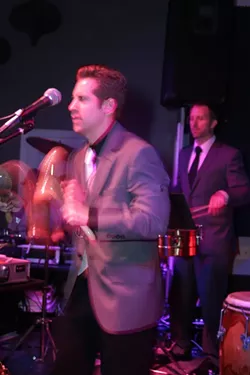 CHA CHA CHA : De La Bahia members Karl Welz and Mike Raynor keep the rhythm going. - PHOTO BY GLEN STARKEY