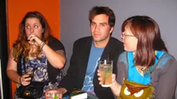 WORK PARTY : Maeva Considine, Colin Rigley, and Ashley Schwellenbach look in various directions while drinking fancy cocktails for a very public going away party that absolutely anyone could have attended.