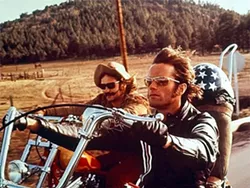 VROOM-VROOM : Dennis Hopper, left, and Peter Fonda, right, star as Wyatt and Billy, two bikers traveling from L.A. to New Orleans in search of America, in Easy Rider. The “New Hollywood” filmmaking culture Hopper’s film embodied is the subject of an intriguing documentary by Kenneth Bowser. - PHOTO COURTESY OF COLUMBIA PICTURES