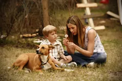 HOW TO MAKE A WISH : Mira Sorvino as Wendy Porter, with her son Joey (played by Maxwell Perry Cotton), whom she seeks to reclaim after giving him up for adoption in the heart-wrenching film, Like Dandelion Dust. - PHOTOS COURTESY OF DOWNES BROTHERS ENTERTAINMENT