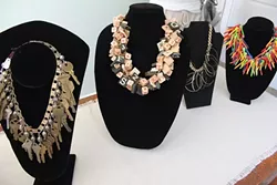 WHERE ARE MY KEYS?: Sue Hogan creates one-of-a-kind jewelry including chunky necklaces made of golf tees, keys, game pieces and more. - PHOTO BY REBECCA LUCAS