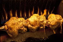 CRISPY SKIN : The rotisserie in the kitchen is used not only for perfectly roasted chickens, but also for pork roasts.