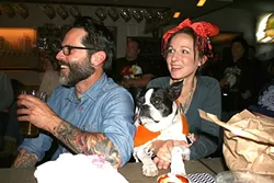LAUGH TRACK: Atascadero locals Greg Cherry and Joey Bell laugh out loud while “bar dog” Jack watches, un-amused. - PHOTO BY HAYLEY THOMAS