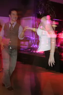 DANCING DJ : Cal Poly Salsa Club member and DJ Chance Siri shows off his dance skills. - PHOTO BY GLEN STARKEY