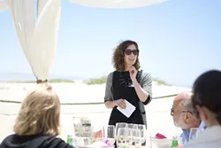 THE CHIEF : Addressing her fellow journalists, Kitty Morgan, the new editor of Sunset, talked a bit about why the Central Coast is one of her favorite places to visit. - PHOTOS BY STEVE E. MILLER