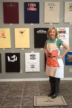 QUEEN TEE : Owner Joanne Limberg displays her art in SLOs mock-gallery T-shirt shop. - PHOTO BY JESSE ACOSTA