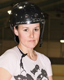 NAME: RESIDENT VIXEN:  AGE: 30 - OCCUPATION: bartender - NUMBER: 5'5" - POSITION: jammer - AVERAGE POINTS PER GAME: 40 - GAMES PLAYED: 11 - PHOTO BY STEVE E. MILLER