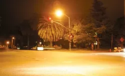 CALM BEFORE THE (UN) STORM: About 40 minutes before police dispersed the only rowdy crowd of the Mardi Gras weekend, the corner of Foothill and California looked like it did on most nights at about 10 p.m.: quiet, cold, and calm. - CHRISTOPHER GARDNER