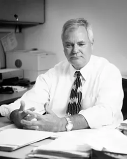 SHEER VOLUME : Michael Piepenburg, a SLO County Veterans Services officer, said that his office files a couple of Posttraumatic Stress Disorder-related cases a week and handles more than 1,200 war-related claims a year. - PHOTO BY STEVE E. MILLER