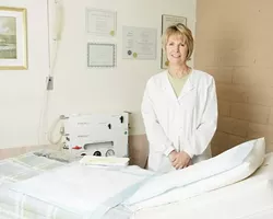 JUST RELAX, THIS WON'T HURT A BIT : Colon hydrotherapy, better known as a colonic, has been around for centuries, but has recently become the procedure du jour among Hollywood's elite. Terry Baker runs the Internal Wellness Center in Atascadero, where she has performed colonics on people suffering from a wide variety of symptoms. Many patients visit her as part of their routine to maintain good health. - PHOTO BY STEVE E MILLER