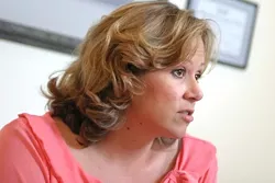 KENA CALLS FOR CASH: Childrens Health Initiative Executive Director Kena Burke says they have raised more than $250,000 so far to help insure children. But they have a long way to go: Their final goal is to raise $1.2 million, which takes care of 1,000 children, by 2008. - CHRISTOPHER GARDNER