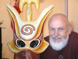 THE MAN AND HIS MASK: Local mask maker Tim Beckwith created this otherworldly mask for a performance at the Los Angeles Craft and Folk Art Museum. - GLEN STARKEY