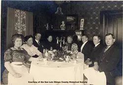 GUESS WHO IS COMING TO DINNER? : The Sauer family of San Luis Obispo the Sauer Adobe across from the Mission is named after them sits down to a Thanksgiving Day dinner at the turn of the century.