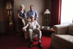 ALL IN THE FAMILY : Undertaking is traditionally a family business. The Reis family--Irene, Gene (seated), and son Kirk--have operated their funeral home in SLO since 1955. - PHOTO BY STEVE E. MILLER