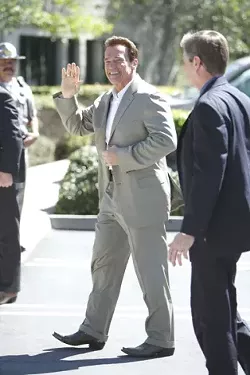 MATTERS OF STATE : Gov. Arnold Schwarzenegger made visits to the City/County Library and the Tribune offices in San Luis Obispo on March 27. Between the two stops, several dozen protestors shouted about his proposed budget cut plan, education, the Iraq war, and more. - PHOTOS BY STEVE E. MILLER