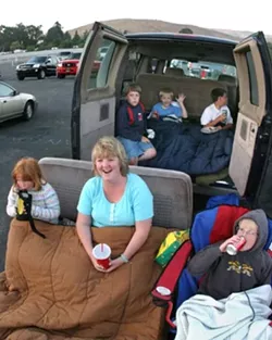 BIRTHDAY BASH: The Slocum family along with some friends came to the drive-in to celebrate 10-year-old Randys (waving in the van) birthday. - CHRISTOPHER GARDNER