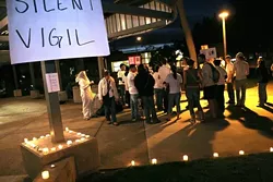 SILENT NIGHT : Community members assembled outside Cal Polys Spanos Theatre to protest controversial speaker Daniel Pipes on March 5. - PHOTO COURTESY OF MEGHAN ISSAACS