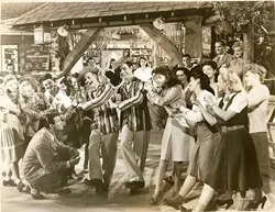 THE SIREN CALL OF THE SILVER SCREEN : The Mercer Brothers danced in the film Youth on Parade to "It Seems I have Heard that Song Before." - PHOTO COURTESY OF BUD MERCER