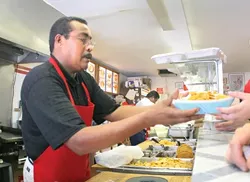 TASTE OF HOME : Fernando Patricio serves up common Mexican fare packed with uncommonly savory flavors at Tacos De Acapulco. - PHOTO BY CHRISTOPHER GARDNER