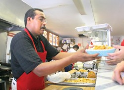 TASTE OF HOME :  Fernando Patricio serves up common Mexican fare packed with uncommonly savory flavors at Tacos De Acapulco. - PHOTO BY CHRISTOPHER GARDNER
