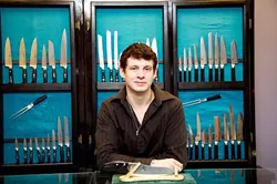 BLADE SLINGER : Jesse Norton sells "mens lifestyle accessories" a category that includes, among other things, knives of all sizes and shapes at Mr. Absolute. - PHOTO BY JESSE ACOSTA