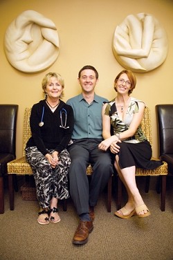 HEALTHY HARMONY:  (Left to right) Nurse practitioner Kathi Fennelly, board-certified OB/GYN Aaron Kromhout, and office manager Victoria Kromhout want to focus on womens health as a whole not just view their patients as a set of reproductive organs. - PHOTO BY JESSE ACOSTA
