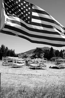BED TACTICS : In August, a long-running permit and zoning battle between the county and Sunny Acres owner Dan De Vaul took a public turn as residents of the self-styled sobriety center set up steel bunk beds along Los Osos Valley Road. They slept outdoors to draw attention to the facility, which they argue picks up where the county fails.
