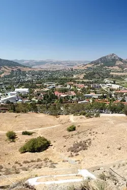 CAMPUS LIFE : Cal Poly's dorms offer convenience: You're just a few steps away from class, and dining facilities mean you don't have to cook for yourself. Still, off-campus housing offers its own advantages. - PHOTO BY STEVE E. MILLER