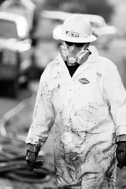 COUNTY MESS : Santa Barbara County's Greka hired independent contractors to clean up a large December oil spill at its Palmer Road facility. After another large spill--this one at Greka's Davis Tank Battery facility in January--the Santa Barbara County Board of Supervisors held a hearing to address the company's spills. Since that hearing, four Greka-owned facilities have been shut down by the county, according to county officials. The company has responded with the threat of a lawsuit. - PHOTO BY STEVE E. MILLER