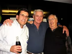 "J" ALL THE WAY : Ernie Dalidio (center) shared a celebratory hug with Scott Dabney (left) and Bill Bird (right) at the culmination of the most-talked-about issue in this county election. - PHOTO BY KAREN VELIE
