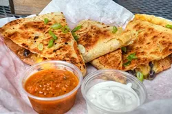 GET YOUR OWN : Chef Jeffry Wiesinger’s dippin’ sauces are cult classics. Pictured, lime crème fraiche and smoky salsa. Tip: dip the chef’s handmade potato chips in the sauces for a crunchy epiphany. - PHOTO COURTESY OF AMY JOSEPH