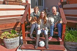 FAMILY ORDEAL : Casey Lieberman (center), a 15-year-old soccer player from Arroyo Grande, suffered a severe concussion in a PE class last February that compromised her vestibular system. Casey experienced months of headaches, dizziness, sensitivity to light, and difficulty concentrating. Following her recovery, she quit soccer and now plays tennis. - PHOTO BY DYLAN HONEA-BAUMANN