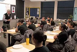 INSPIRE: Orchestra Novo conductor Maestro Michael Nowak spent two days at Grizzly Youth Academy, inspiring the cadets to create original art to the sounds of Maurice Ravel’s “Pavane for a Dead Princess.” - PHOTO COURTESY OF CRISSA HEWITT