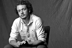 BILDUNGSROMAN: Singer-songwriter and fingerstyle guitarist Rowan McGuire presents coming-of-age songs on April 14, at Linnaea’s Café. - PHOTO COURTESY OF ROWAN MCGUIRE