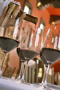 IT’S GOT LEGS: Wine tasting, events, and retail sales are a large factor of the SLO County wine industry’s economic impacts, according to a UC Davis study recently commissioned by the Paso Robles Wine Country Alliance. - PHOTO COURTESY OF PASO ROBLES WINE COUNTRY ALLIANCE