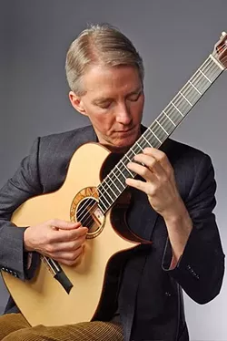 JAZZ MASTER : Jazz guitar great John Stowell plays a solo dinner show in the cellar at Novo on Feb. 21. - PHOTO BY MARK LAMOREAUX