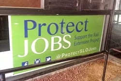 NEW IN TOWN : Residents, Phillips 66 employees, and members of a labor union from the Southern California joined local members of Protect SLO Jobs to speak in support of a rail extension project proposed at a SLO County refinery. - PHOTO BY CHRIS MCGUINNESS