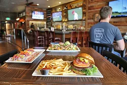 ATOWN PROUD: Street Side Ale House offers up juicy beef burgers topped with smoked gouda cheese; snapper fish tacos with crunchy pickled veggies; and cheesy carnitas tacos crowned with creamy guacamole. - PHOTO BY DYLAN HONEA-BAUMANN