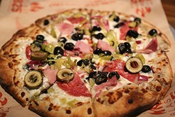 PIZZA, YOUR WAY:  At Blast 825 Taproom, you can choose your dough, sauces, toppings, and walk away with a custom personal pizza for less than $10. - PHOTO BY DYLAN HONEA-BAUMANN