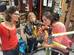 BE A TEACHER: Kylie Mendonca (left) leads a workshop during Women’s Night at the Bike Kitchen while Elisabeth DeSwart (Center) and Emma Patterson (right) practice bike repair techniques. Women’s Night takes place every Thursday night at the Bike Kitchen from 6:30 to 8:30 p.m. - PHOTO COURTESY OF BIKE SLO COUNTY