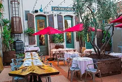 ROOM TO CHEW: Boasting more than 6,000 square feet, popular Central Coast Italian restaurant Giuseppe’s Cucina Rustica now features an ample dining rom, outdoor courtyard, full bar, deli express, and separate garden room for parties and events. - PHOTO BY JAYSON MELLOM