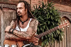 ACTIVIST: Michael Franti & Spearhead will bring their socially conscious sounds to Avila Beach Resort on Aug. 25. - PHOTO COURTESY OF MICHAEL FRANTI