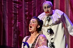 SINGING OUT LOUD: Soprano Katharine Gunnink as Nedda sings opposite Tenor David Gustafson as Canio in OperaSLO’s production of Leoncavallo’s Pagliacci at the Cal Poly PAC in 2015. - PHOTO COURTESY OF LUIS ESCOBAR REFLECTIONS PHOTOGRAPHY STUDIO