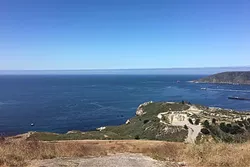 FAR OUT: The ocean stretches west from the top of Ontario Ridge, with a view of the Avila Beach Pier to the right. - PHOTO BY KAREN GARCIA