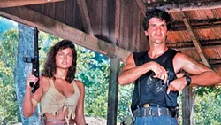 BUNGLE IN THE JUNGLE: Nazi hunters Nelia (Nelia J. Cozza) and Tonio (Romulo Arantes) search the South American jungles for an evil Nazi doctor in this trashy ’80s action film. - PHOTO COURTESY OF INTERNATIONAL SCREEN AND TAT FILMPRODUKTION