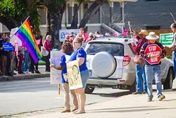 IN IT FOR THE LONG HAUL: After the success of the Women’s March in SLO, local organizers and groups have been working together to carry on its momentum, including organizing a 700-person silent counter-demonstration to a protest of SLO’s Planned Parenthood. - PHOTO BY JAYSON MELLOM