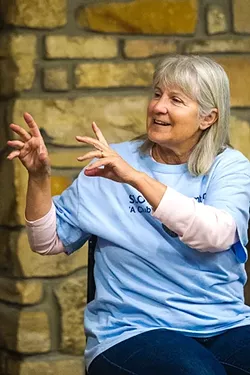 GIVING HER TIME: SLO Senior Citizens Center volunteer PJ Crawford leads the chair exercise program there, which meets twice a week on Tuesday and Thursday mornings. - PHOTO BY JAYSON MELLOM